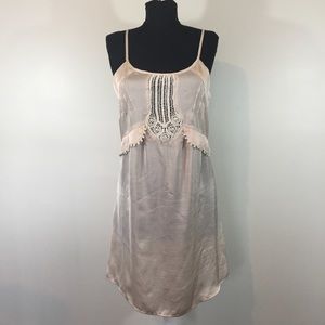 Urban Outfitters | woman’s tan dress
